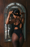 Be Mine sheer black tights—elegant, bold, and crafted to make a lasting impression with a hidden message.