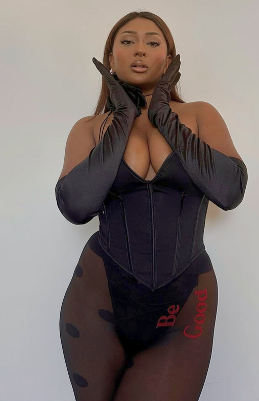 Date night outfit with black corset and Be Good tights—featuring polka dots and hidden statement embroidery