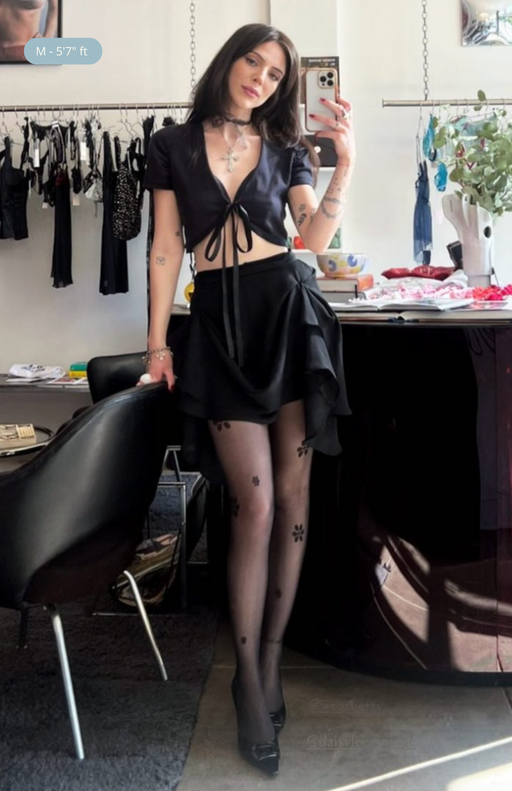 Love Me tights styled with black mini skirt—only delicate floral embroidery visible for a cute look
