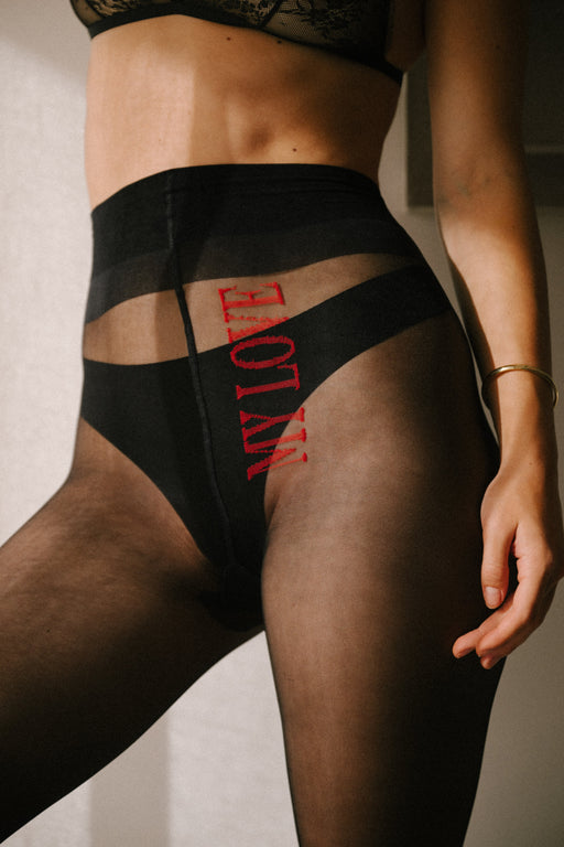 “My Love” red embroidery on black sheer tights—soft, subtle, and full of romantic intrigue.