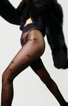 You Wish tights in motion, showcasing minimalist stars and luxury Italian sheerness